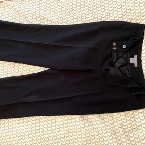Black Ann Taylor dress pants fully lined back pockets and belt loops.